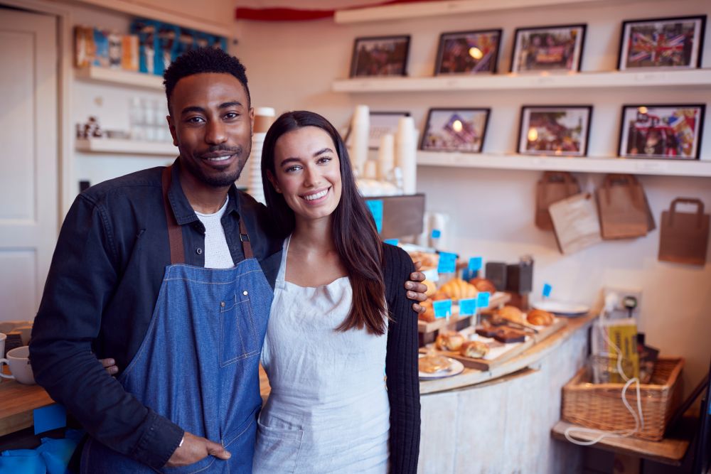 Small business owners enjoying local seo marketing efforts